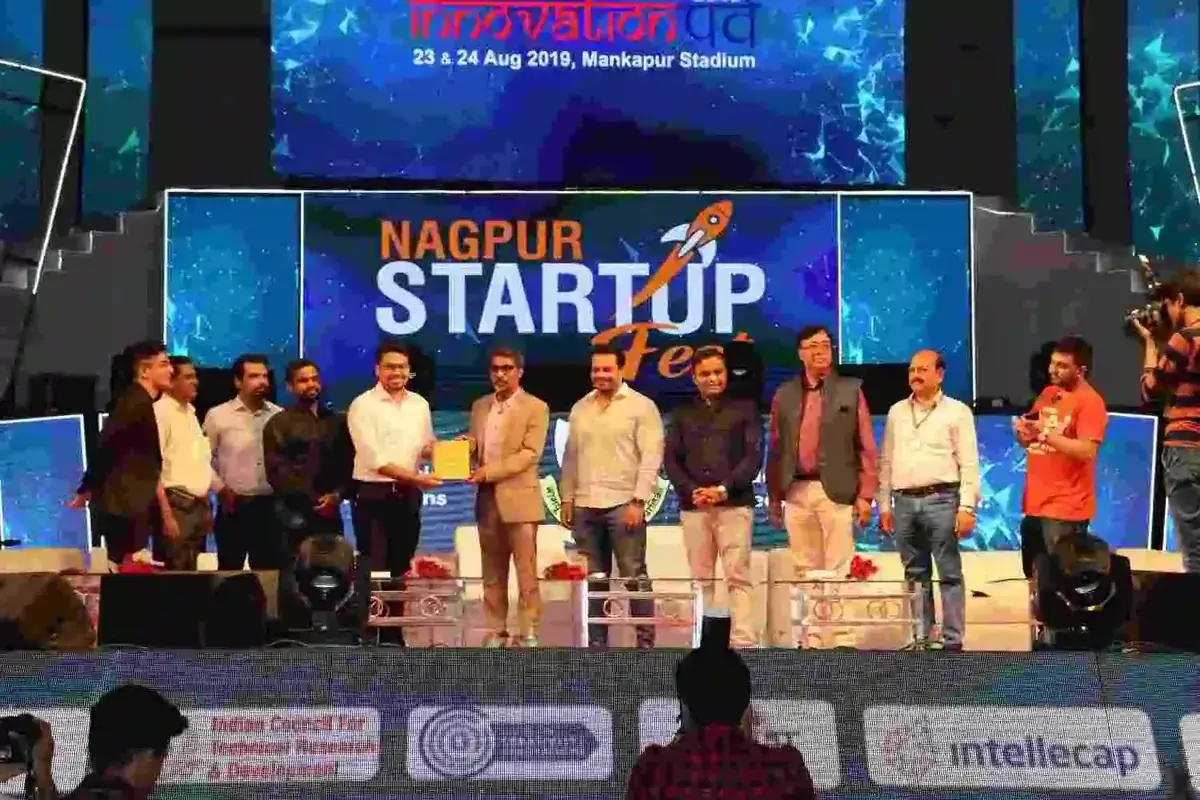 Fireblaze receiving an award on stage at the Nagpur Startup Fest 2019 at Mankapur Stadium